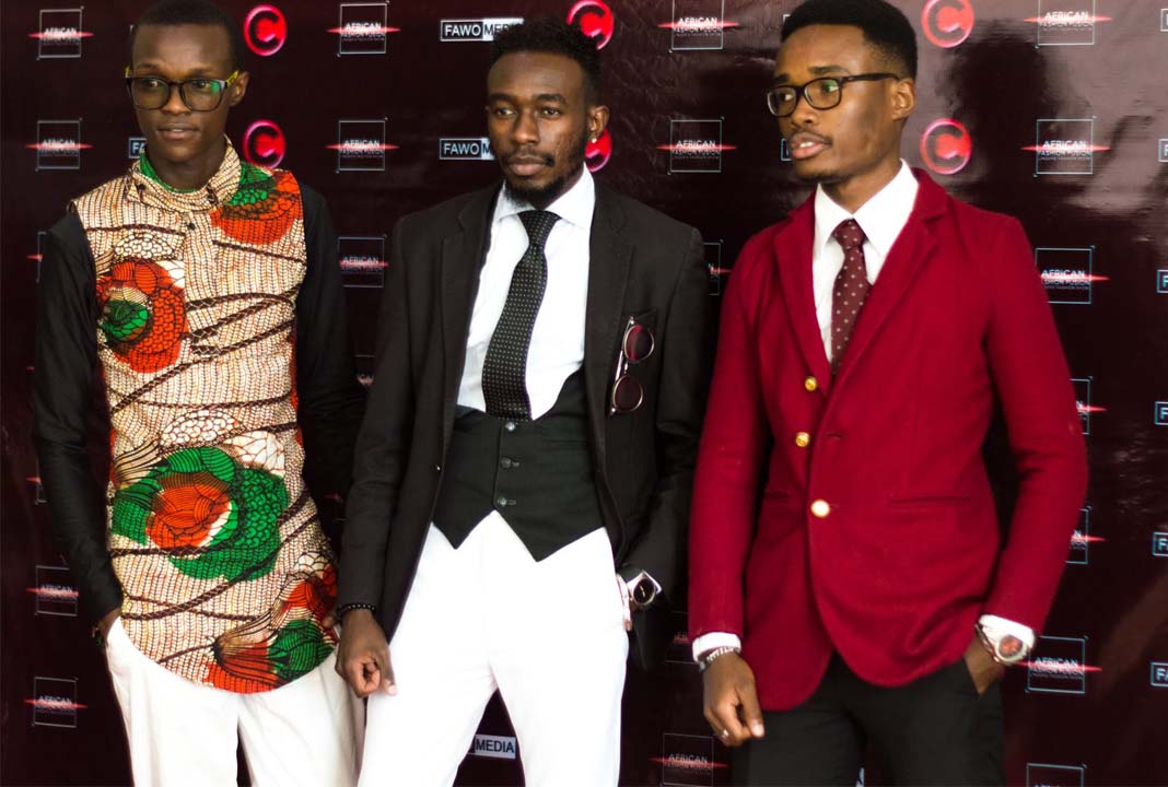 Guests and models enjoying red carpet photography at the same event in 2017