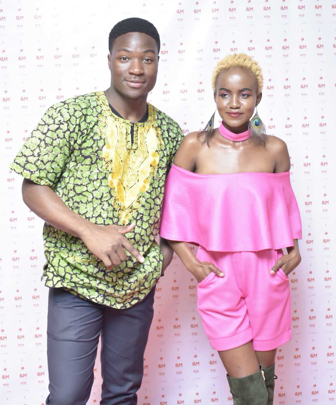 African Fashion Fusion 3: Sharon Madonna of Concept World and Clive Luppiizzy pose for a photo during the event. 