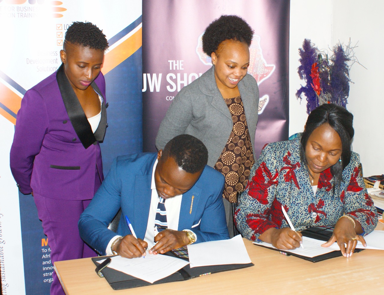 Kenyan Fashion Industry: Sheila and Angela witnessing the signing of an MOU between the JW Show and CBiT East Africa on 26th of April 2019