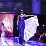 A model showcasing a designs by Aqil fashion house at the JW Show 2019