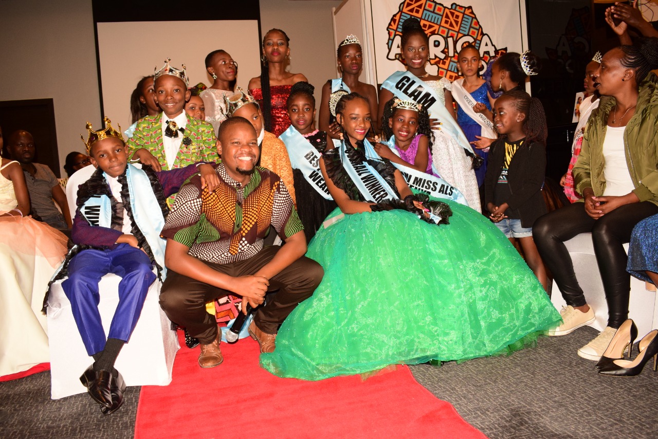 Media personality & show host Mung'ala Mbuvi poses with newly crowned winners at the Amazing Little Stars 2019