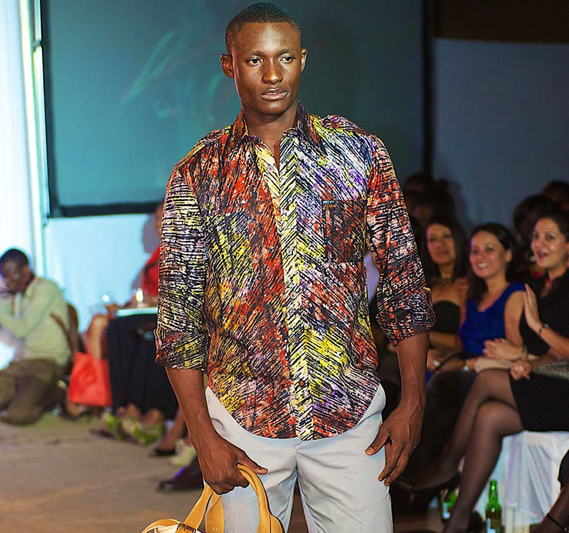 A model showcases Men's wear design by Kikoromeo at a previous High Fashion show