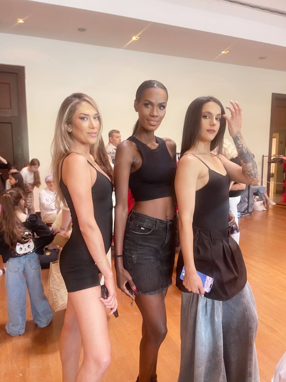 Ms. Eleshia Ais interacting with other international models at the Fashion Week Türkiye 2025 event in Istanbul